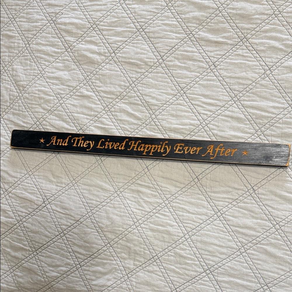 Black and Gold Decorative Sign